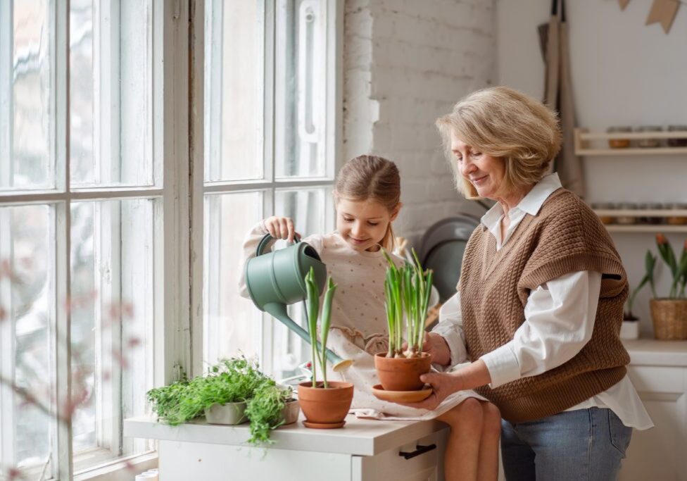 An,Elderly,Woman,Grandmother,And,A,Little,Girl,Granddaughter,Take