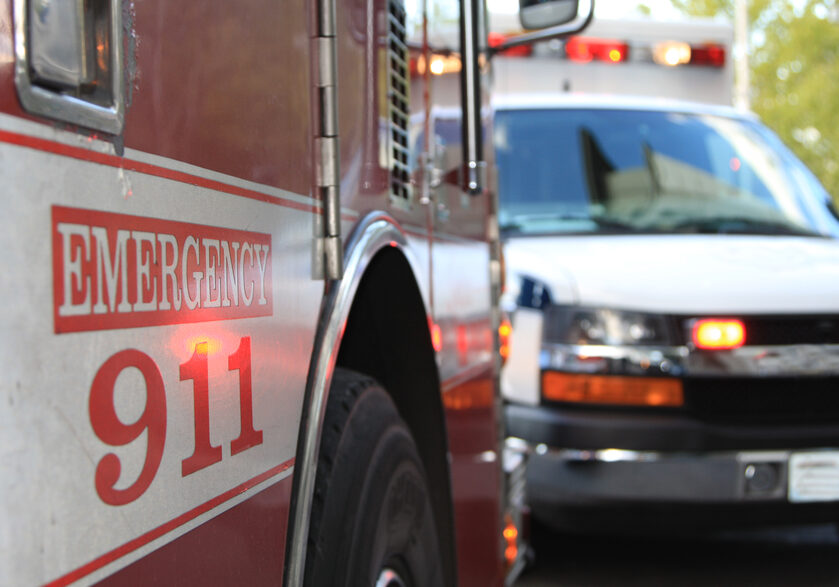 This is an emergency scene including both a fire engine and an ambulance.
