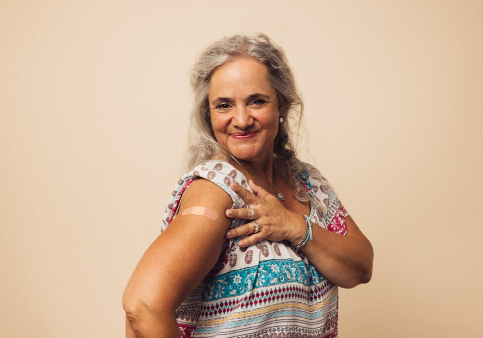 Senior,Woman,Looking,Happy,After,Getting,Vaccine.,Elderly,Female,Showing