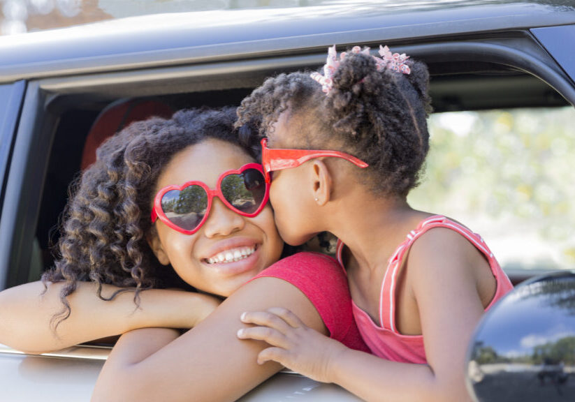 Summer,Fun!,Happy,Girls,Or,Sisters,With,Heart,Shaped,Sunglasses