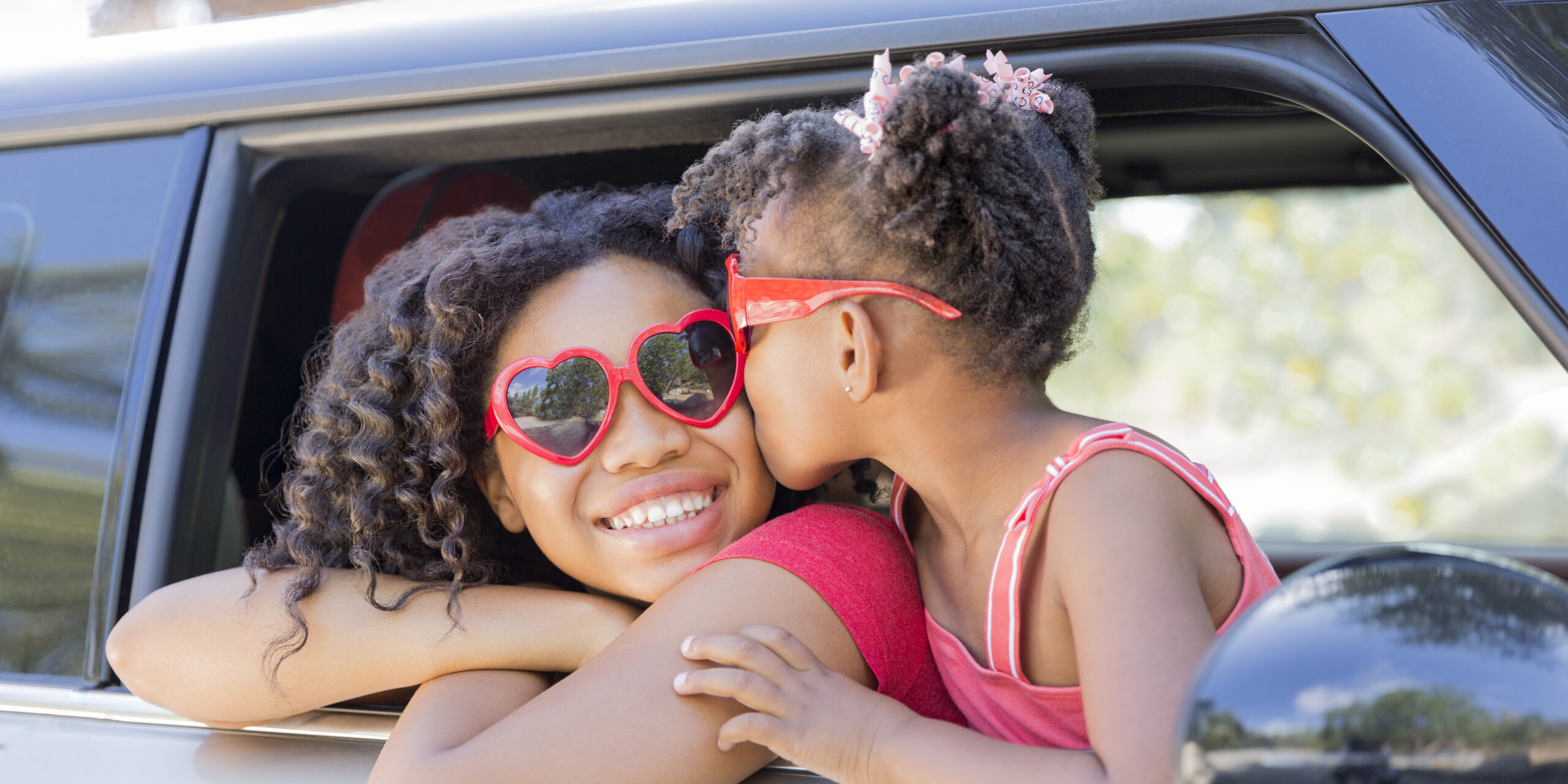 Summer,Fun!,Happy,Girls,Or,Sisters,With,Heart,Shaped,Sunglasses